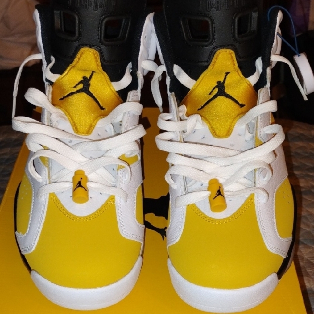 Jordan Yellow and Black High-Top Sneakers with Iconic Logo